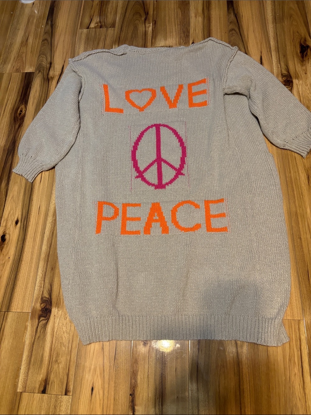 Graphic 'Love Peace' Beige Knit Cardigan with Bright Accents